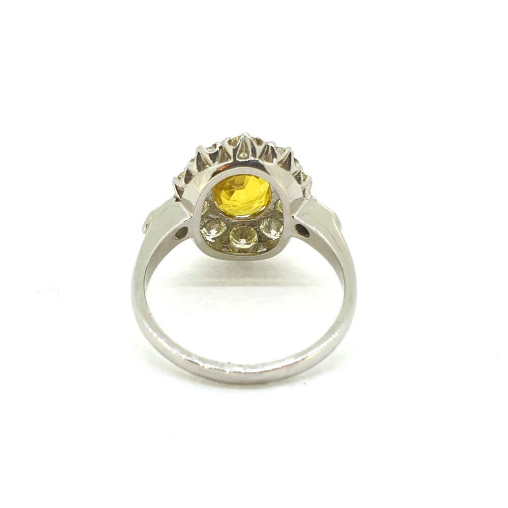 Yellow Sapphire and Diamond Cluster Engagement Ring in Platinum
