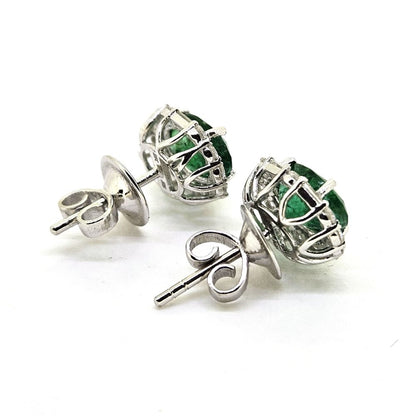 2.44ct Oval Emerald Stud Earrings with Baguette and Brilliant Diamond Halos