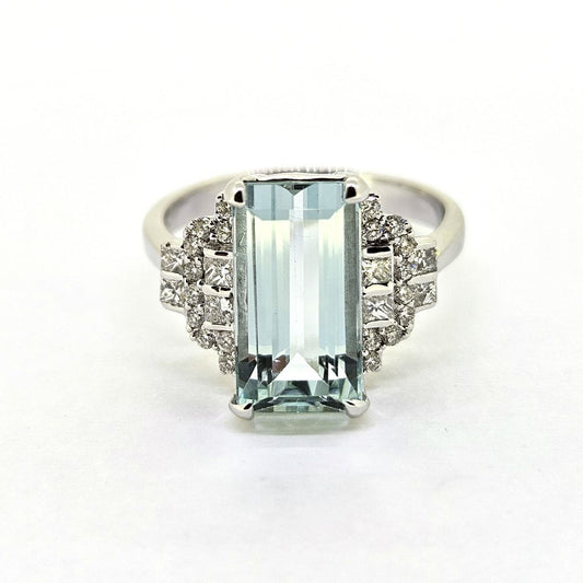 3.75ct Aquamarine Ring with Stepped Diamond Shoulders, 3.75ct baguette rectangular step cut aquamarine flanked by diamond-set stepped shoulders in 18ct white gold