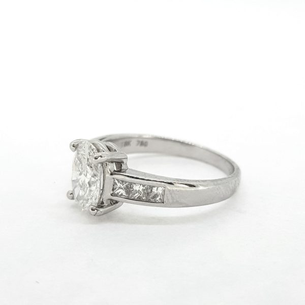 1.22ct Oval Cut Diamond Engagement Ring with Princess Cut Diamond Shoulders