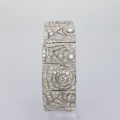 Art Deco Style Diamond Panel Bracelet, 16.50 carat total, each panel is set with brilliant cut diamonds in geometric and floral designs, in 18ct white gold