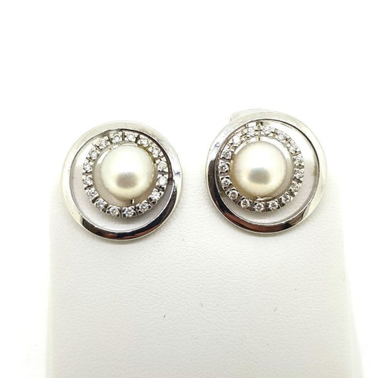 Contemporary Pearl and Diamond Halo Cluster Earrings; central pearls within diamond halos and surrounded by an outer 14ct white gold border