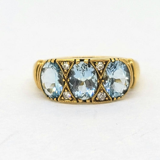Aquamarine Three Stone Ring in 18ct Yellow Gold with Diamond Accents