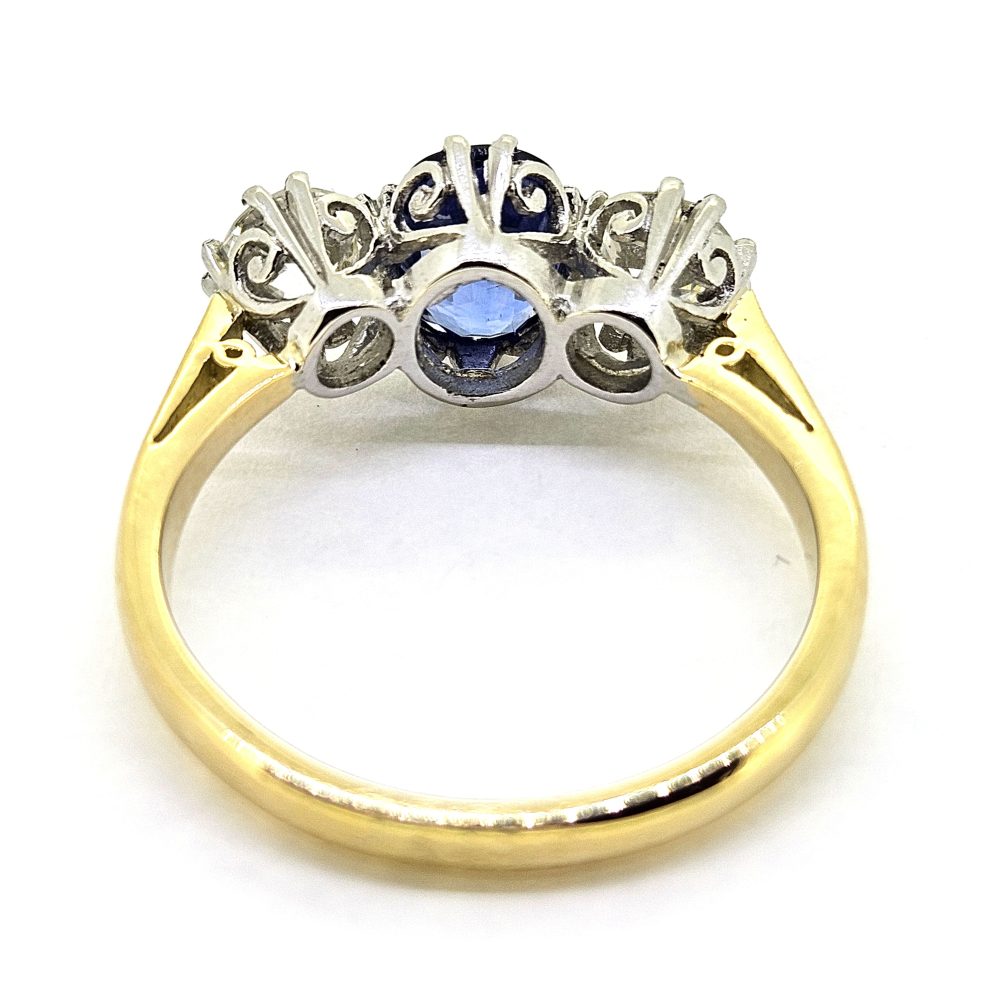 1.20ct Oval Sapphire and Diamond Three Stone Engagement Ring
