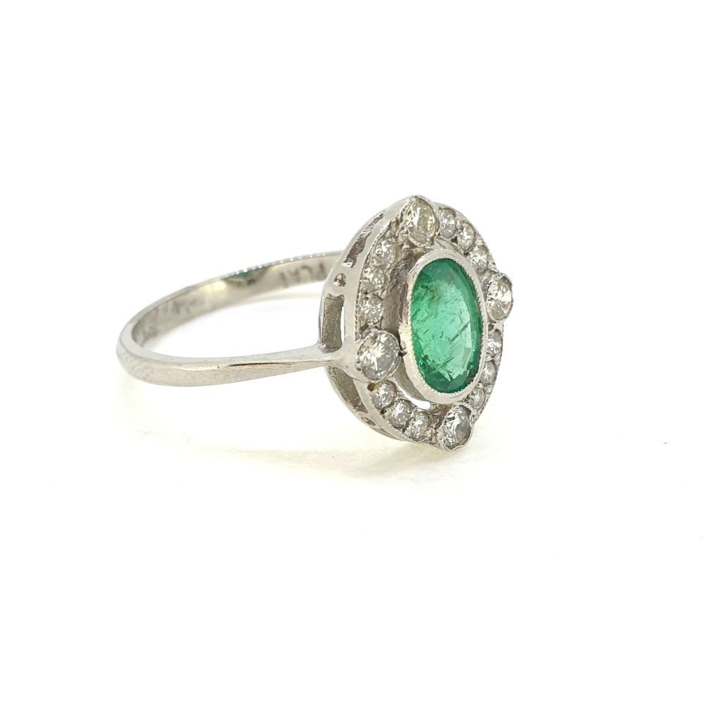 Oval Emerald and Diamond Halo Cluster Ring in Platinum