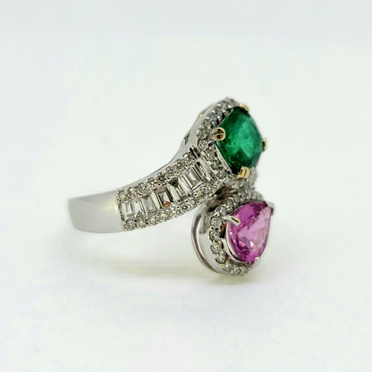 Contemporary 1.04ct Pear Cut Pink Sapphire 0.85ct Emerald and 0.77ct Diamond Cluster Toi et Moi Two Stone Crossover Ring in 18ct White Gold