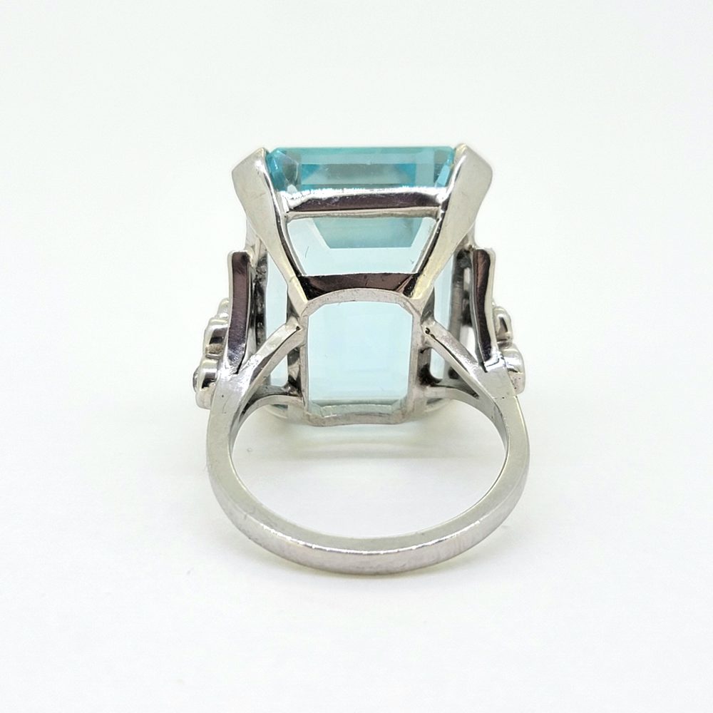 30ct Emerald Cut Aquamarine Cocktail Ring with Diamonds, large 30ct emerald-shaped step-cut aquamarine accented with sparkling diamonds to the shoulders in 18ct white gold