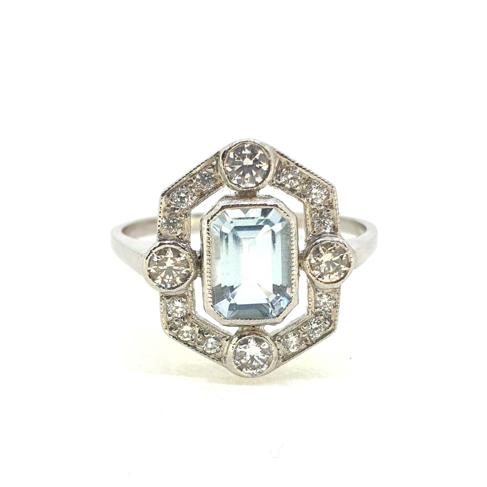 Contemporary 0.90ct Aquamarine and Diamond Halo Cluster Ring in Platinum