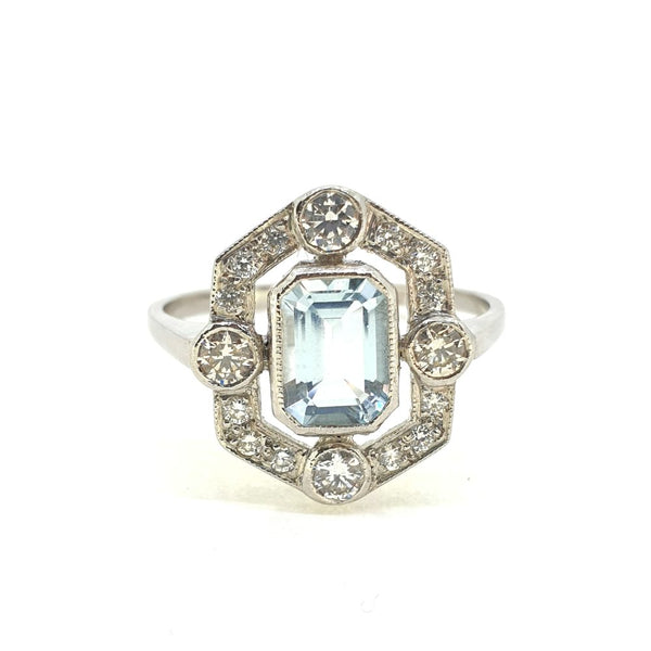 Contemporary 0.90ct Aquamarine and Diamond Halo Cluster Ring in Platinum