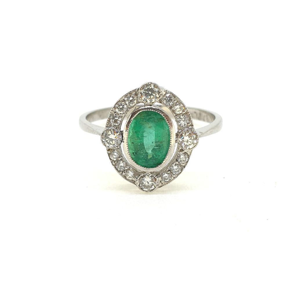 Emerald and Diamond Oval Cluster Ring in Platinum