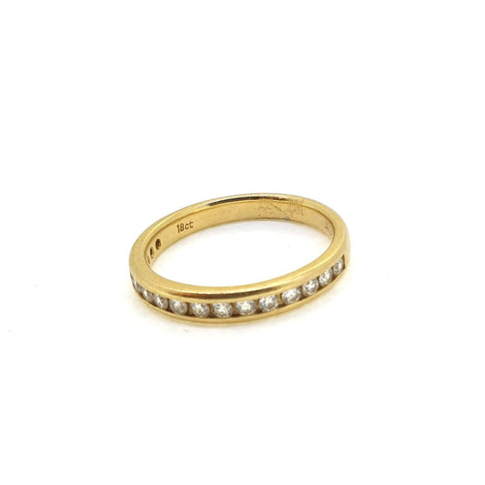 Channel Set Diamond Half Eternity Ring in Yellow Gold