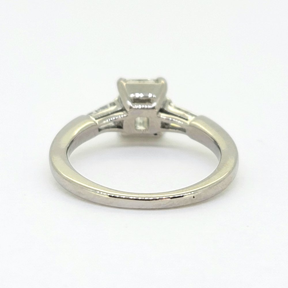 Emerald Cut Diamond Engagement Ring with Tapered Baguette Diamonds in Platinum, solitaire single stone 1.08ct emerald-cut diamond flanked by elegant tapered baguette-cut diamond shoulders