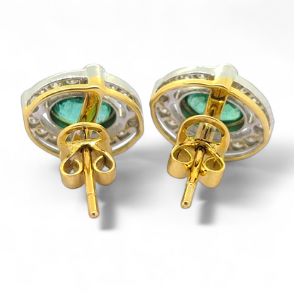 A pair of oval emerald and brilliant cut diamond oval cluster stud earrings in yellow and white gold