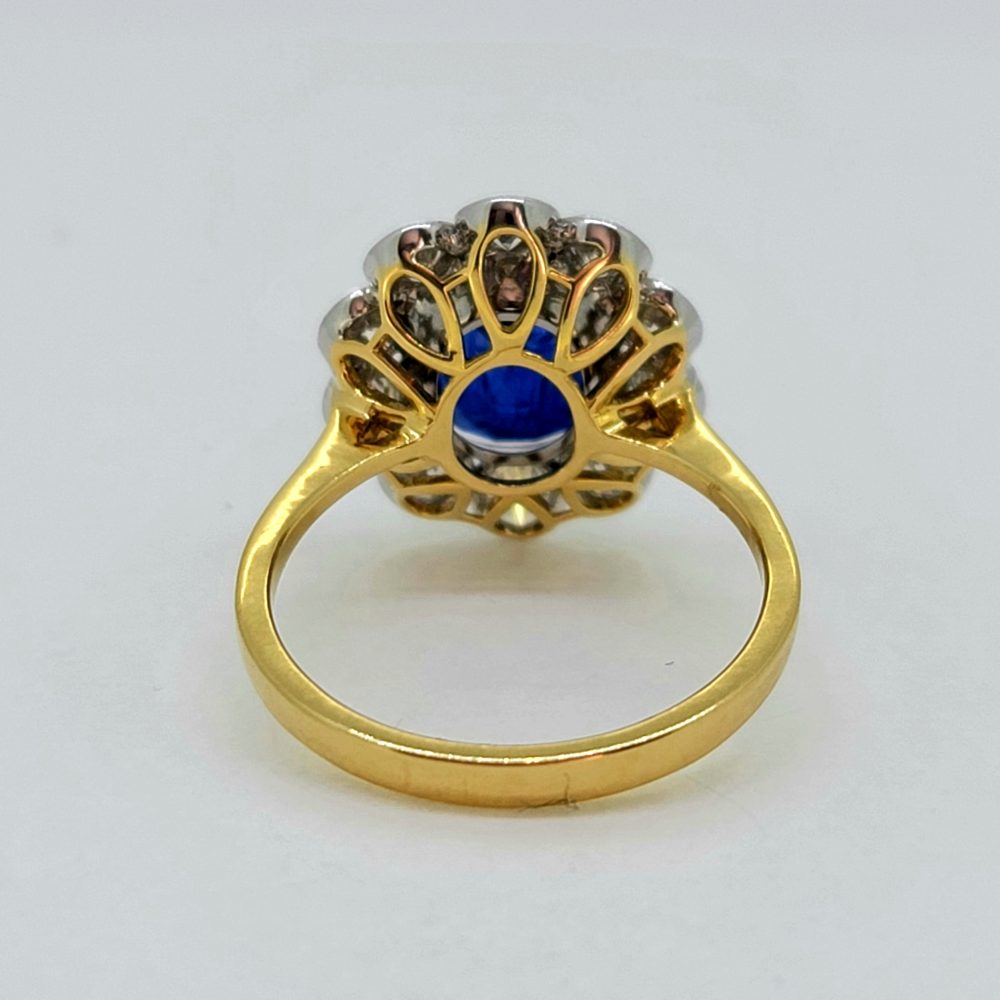 4.62ct Oval Sapphire and Diamond Cluster Engagement Ring