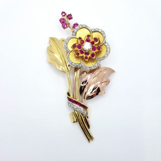 Vintage Ruby and Diamond Flower Spray Brooch; floral brooch dating from the 1940's set with rubies and diamonds, high carat yellow, rose and white gold