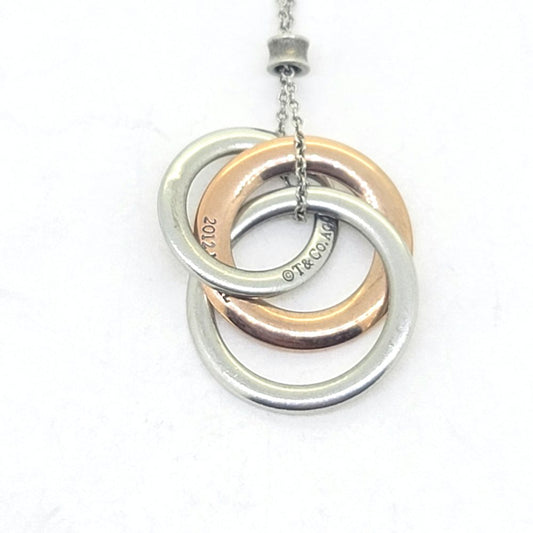Vintage Tiffany and Co Interlocking Circles Pendant Circa 2012, bi-colour 925 silver and rubedo triple interlocking circle pendant and chain by Tiffany & Co from the 1837 Rubedo collection