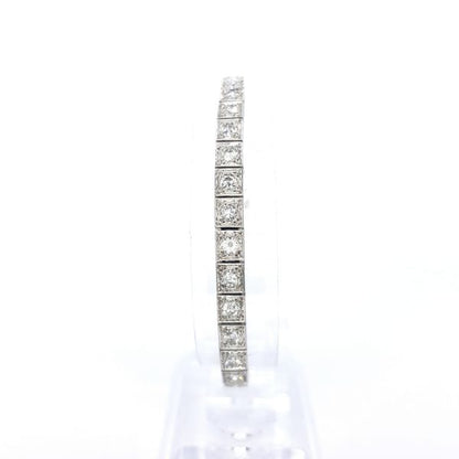 Diamond Line Bracelet in 18ct White Gold; featuring 4 carats of round brilliant-cut diamonds in individual square settings, in 18ct white gold