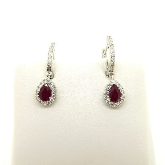 Ruby and Diamond Cluster Drop Earrings; featuring 1.02ct rubies within diamond surrounds and suspended from diamond-set drops, in 18ct white gold