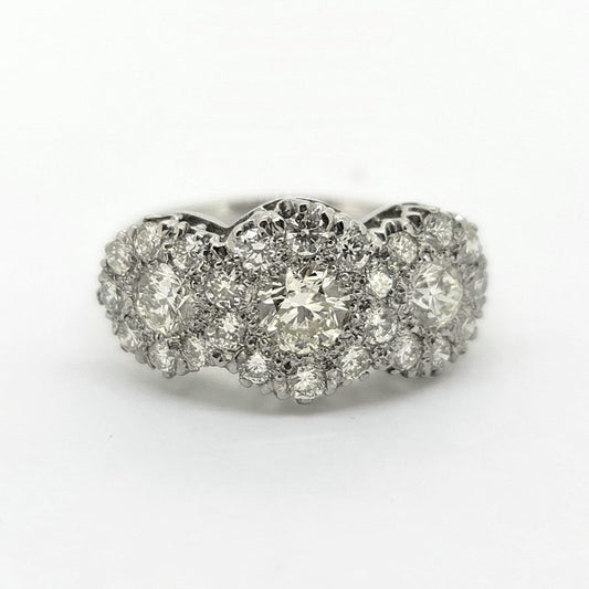 Modern Triple Diamond Cluster Three Stone Trilogy Cluster Ring in Platinum, three principal diamonds all within diamond surrounds, 1.85 carat total