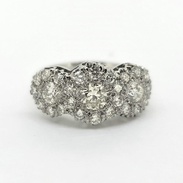 Modern Triple Diamond Cluster Three Stone Trilogy Cluster Ring in Platinum, three principal diamonds all within diamond surrounds, 1.85 carat total