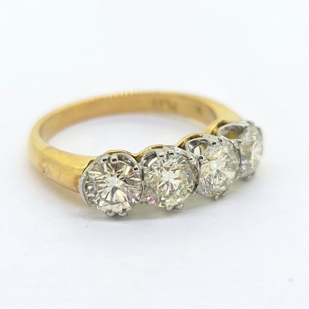 2.06ct Four Stone Diamond Engagement Ring in Yellow Gold, 2.06 carats four round brilliant-cut diamonds claw set in platinum to 18ct yellow gold band