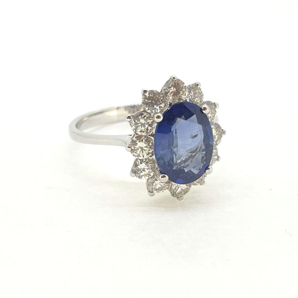2.54ct Oval Sapphire and Diamond Cluster Engagement Ring