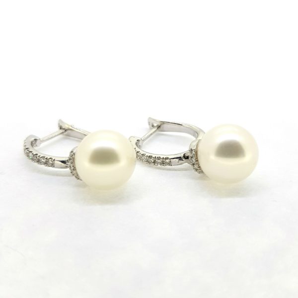Freshwater Pearl and Diamond Drop Earrings; featuring 9.5mm freshwater pearls suspended via 0.41cts diamond-set drops