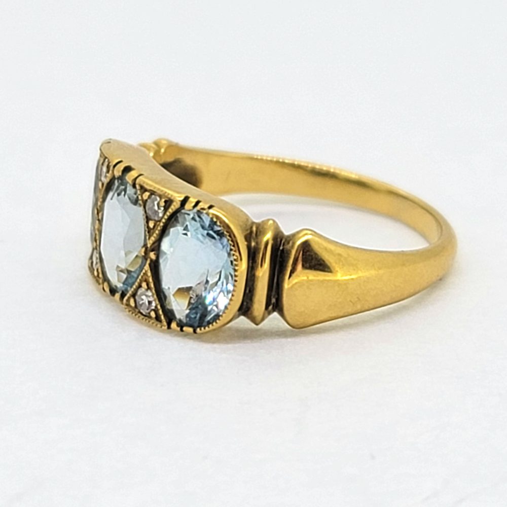 Aquamarine Three Stone Ring in 18ct Yellow Gold with Diamond Accents