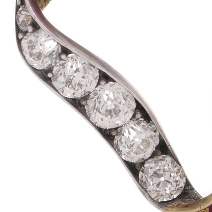 Late Victorian Antique Burma Ruby and Old Cut Diamond Ribbon Brooch, late Victorian 15ct gold ribbon brooch set with Burma rubies and old European-cut diamonds. Circa 1900