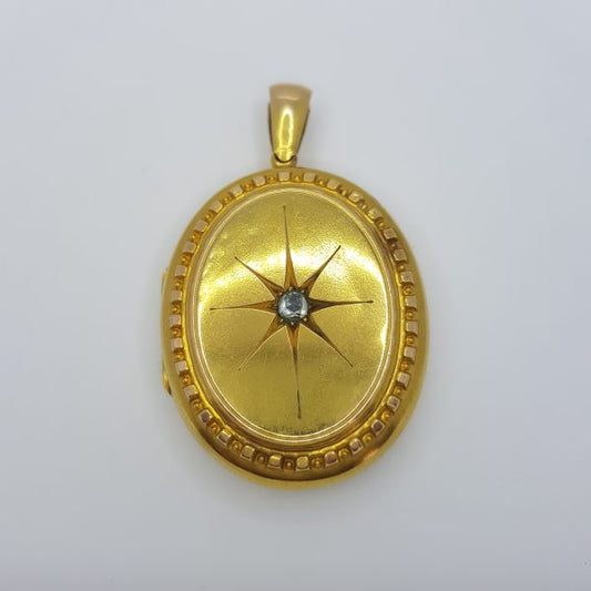 Antique 15ct Gold Locket Pendant with Old Cut Diamond; 15ct yellow gold oval locket set with a central old-cut diamond within a star design
