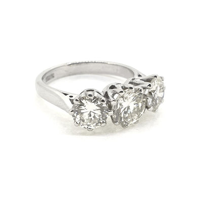 Vintage Diamond Three Stone Engagement Ring, 3 carat total, claw set with three round brilliant-cut diamonds in 18ct white gold. Circa 1994