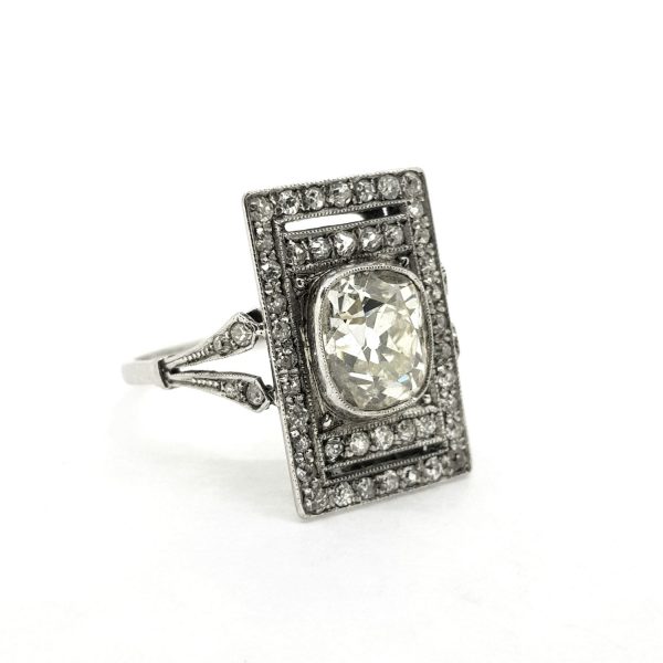 Old Cut Diamond Plaque Tablet Ring; central 2.35ct old-cut diamond set within a diamond-set rectangular surround, with diamond-set split shoulders and pierced under-gallery, in 18ct white gold