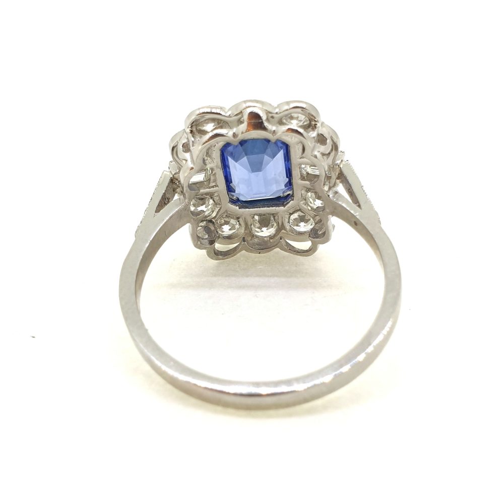 2ct Emerald Cut Sapphire and Diamond Floral Cluster Ring in Platinum