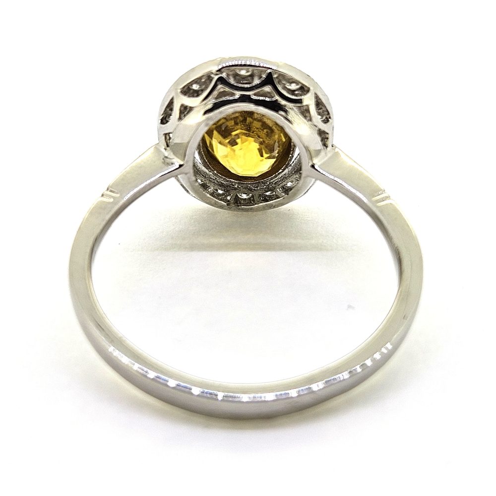1.90ct Oval Yellow Sapphire and Diamond Halo Cluster Engagement Ring in Platinum