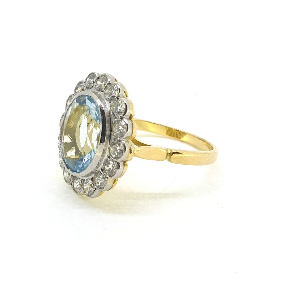 3ct Oval Aquamarine and Diamond Floral Cluster Ring
