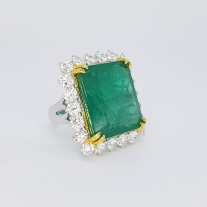Zambian Emerald and Diamond Cluster Dress Ring; large 22.37ct certified natural Zambian emerald-cut emerald within a 2.30ct diamond surround, in 18ct gold