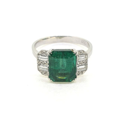 Contemporary 2.85ct Emerald and Diamond Three Stone Engagement Ring