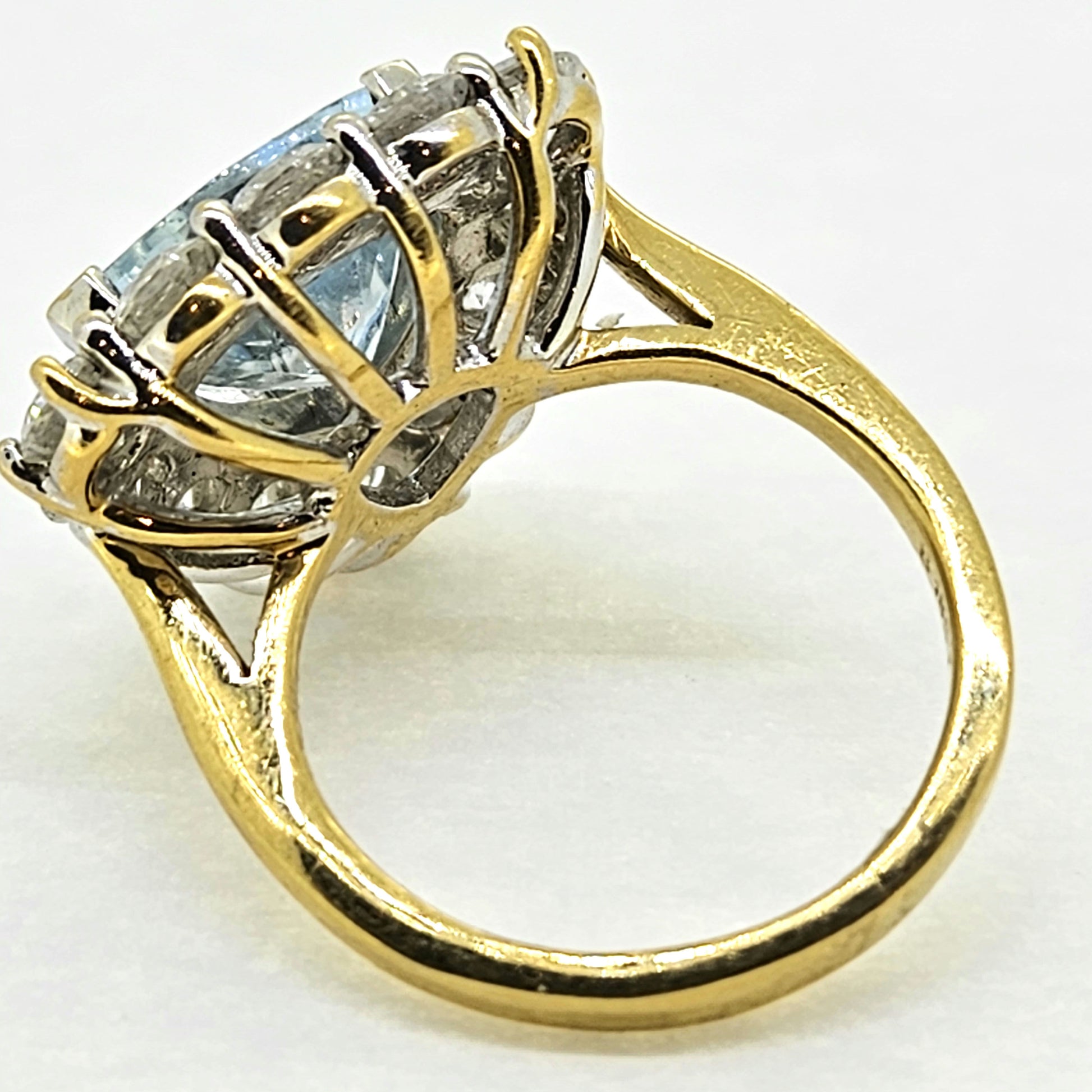 3ct Triangular Aquamarine and 2ct Diamond Cluster Ring