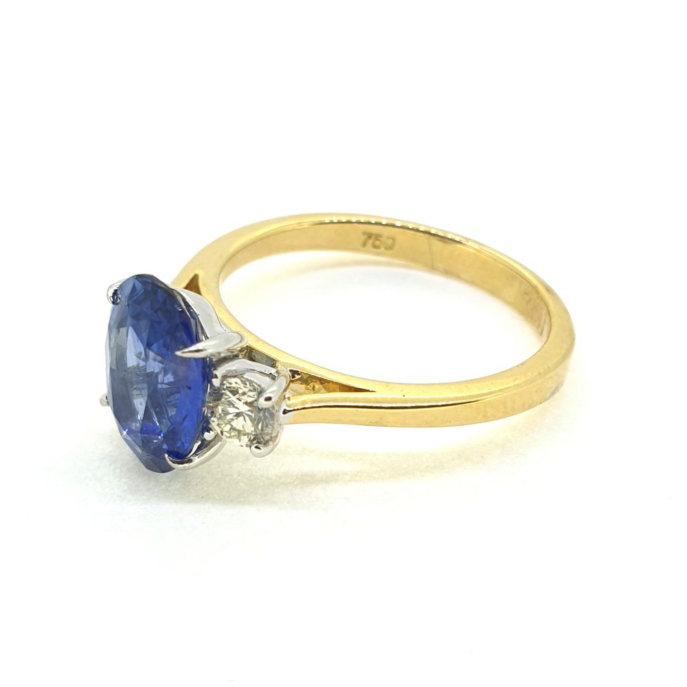 2.84ct Oval Sapphire and Diamond Three Stone Engagement Ring