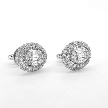 Baguette and Brilliant Cut Diamond Cluster Earrings; set with 1.35 carats of baguette and brilliant-cut diamonds in an oval design, in 18ct white gold