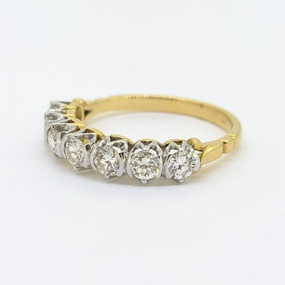 1ct Diamond Seven Stone Half Eternity Ring, 18ct yellow gold ring set with seven round brilliant-cut diamonds in a modern half eternity band ring design
