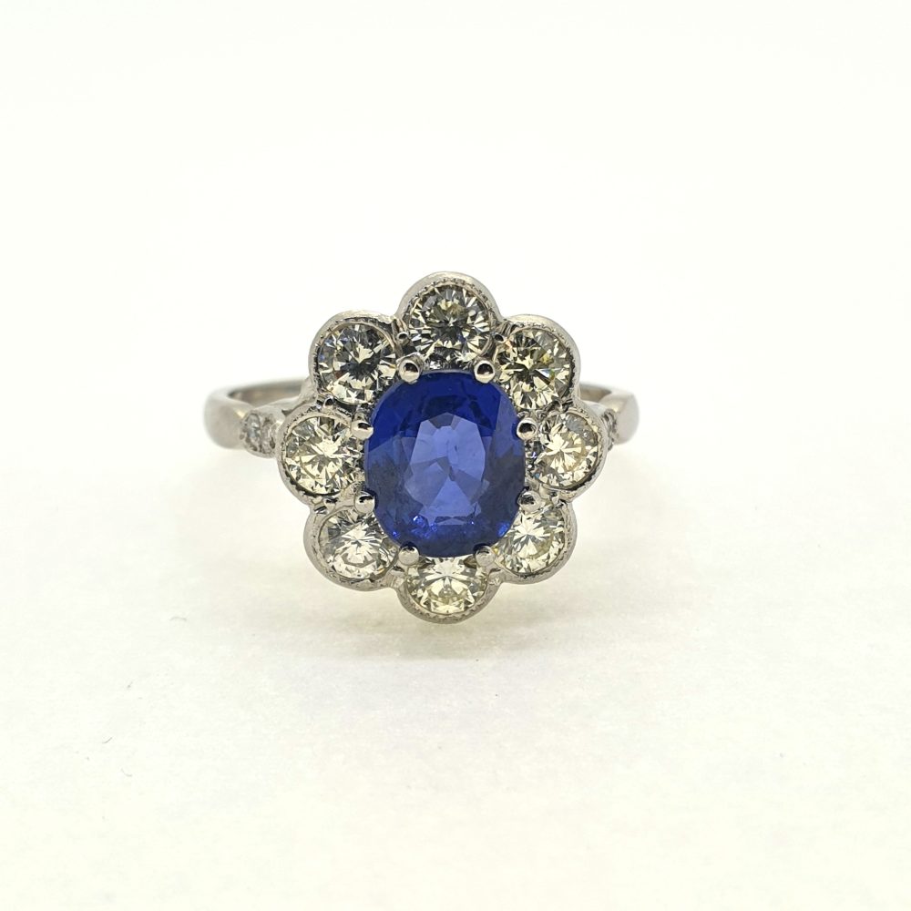 1.90ct Oval Sapphire and Diamond Cluster Engagement Ring in Platinum