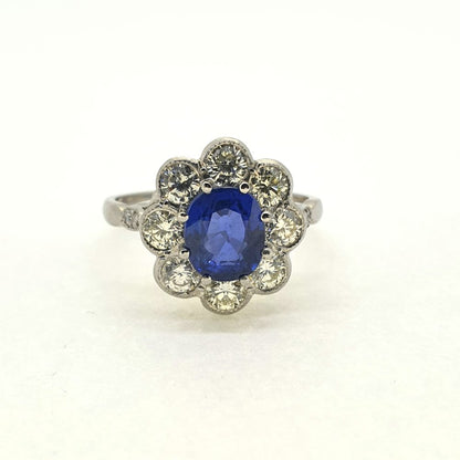 1.90ct Oval Sapphire and Diamond Cluster Engagement Ring in Platinum