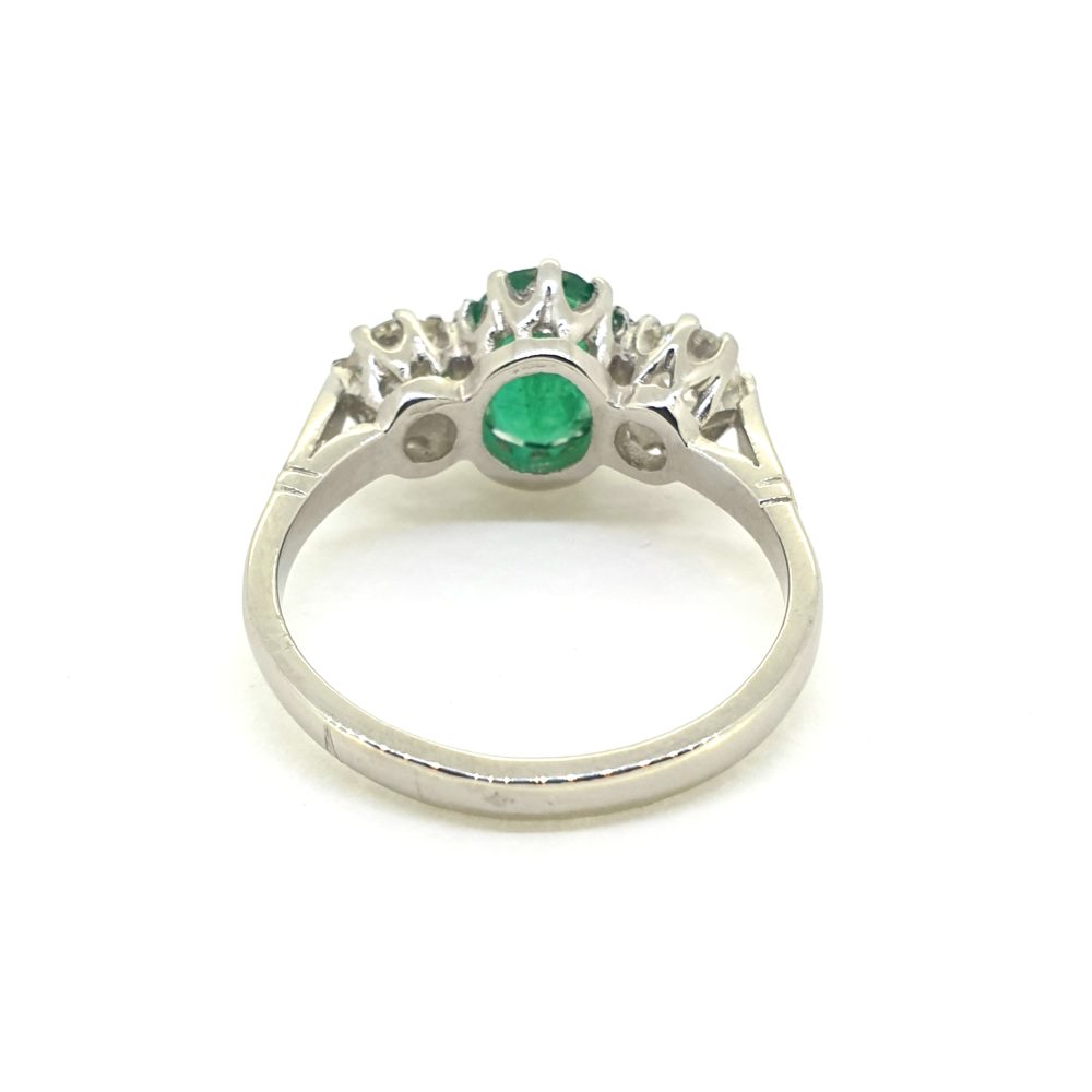 1.30ct Oval Emerald and Diamond Three Stone Engagement Ring in Platinum