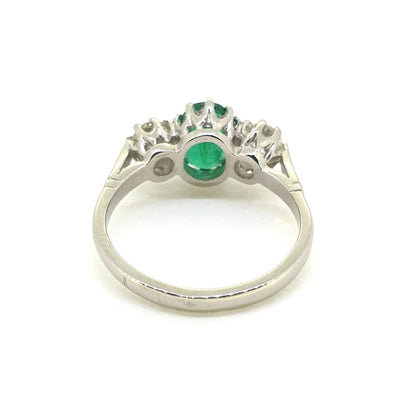 1.30ct Oval Emerald and Diamond Three Stone Engagement Ring in Platinum