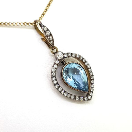 Aquamarine and Diamond Pear Shaped Cluster Pendant; central 7ct pear-shaped aquamarine suspended within a 1.25ct diamond surround