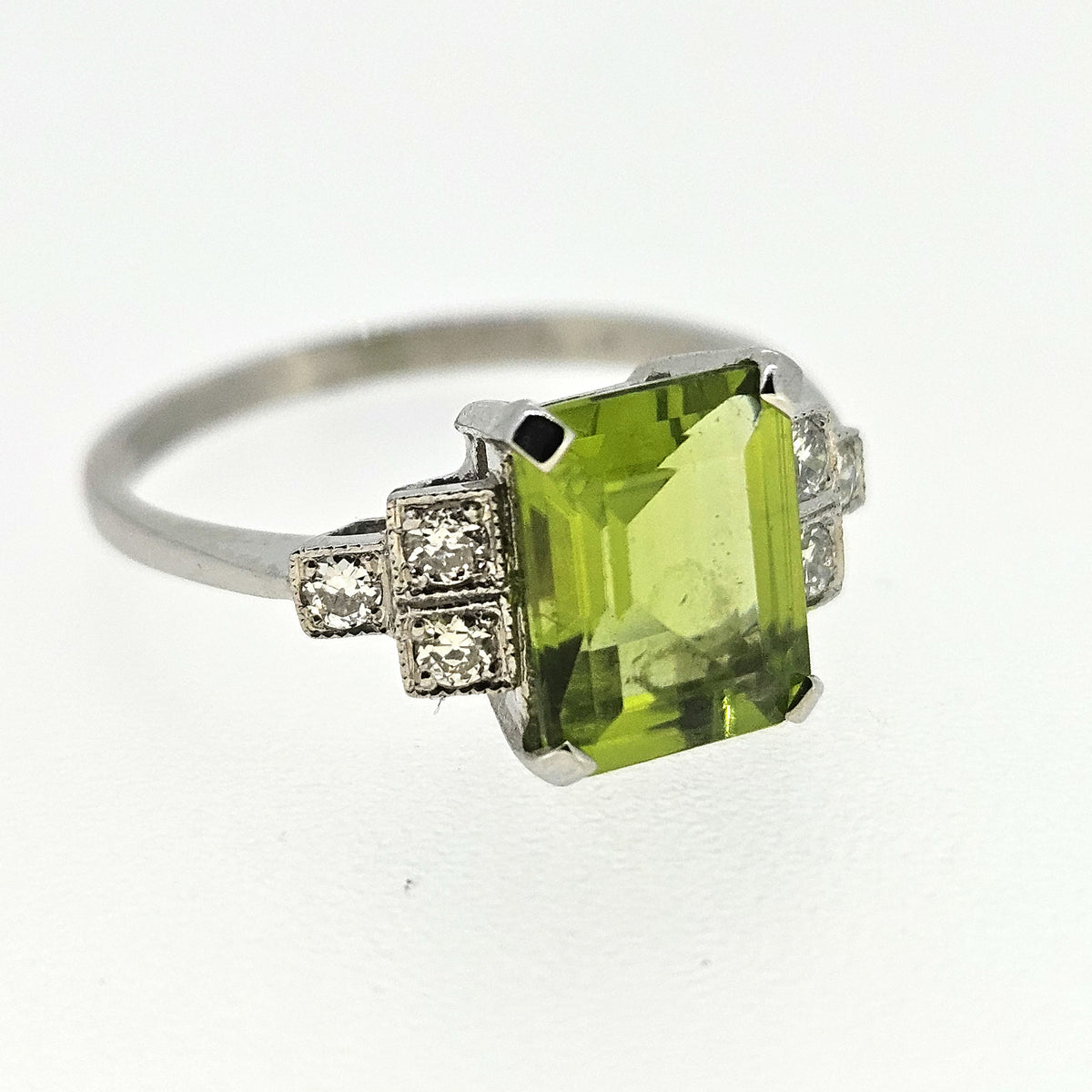 Art Deco Style Platinum Peridot 2.30 Carats and Diamond 0.12 Carat Ring