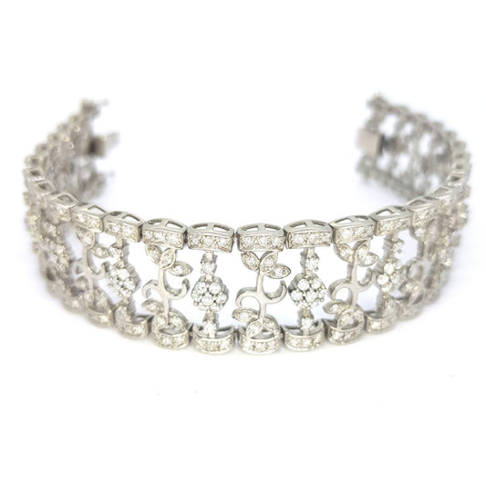 Floral Diamond Bracelet in 18ct White Gold, 6 carat total, floral and leaf design links set with 6cts of round brilliant-cut diamonds