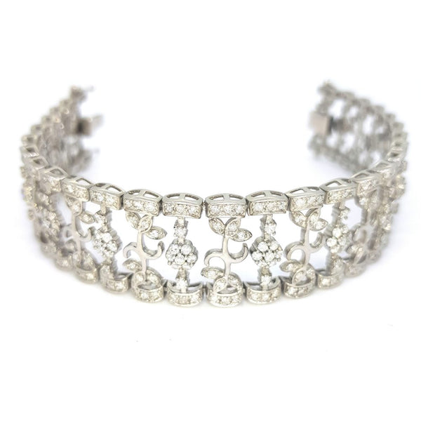 Floral Diamond Bracelet in 18ct White Gold, 6 carat total, floral and leaf design links set with 6cts of round brilliant-cut diamonds