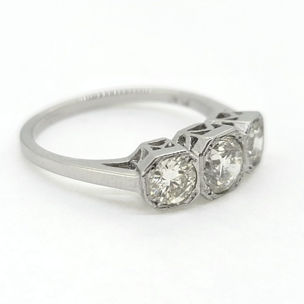 Three Stone Diamond Engagement Ring in Platinum, 1.25 carat timeless diamond trilogy ring set with three sparkling diamonds in octagonal platinum settings
